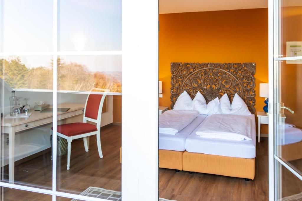Anblick Zimmer vom Balkon aus
